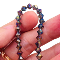 6mm Thunder Polish Glass Crystal Bicone Mexican Blue AB