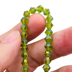 6mm Thunder Polish Glass Crystal Bicone Lt. Olivine AB