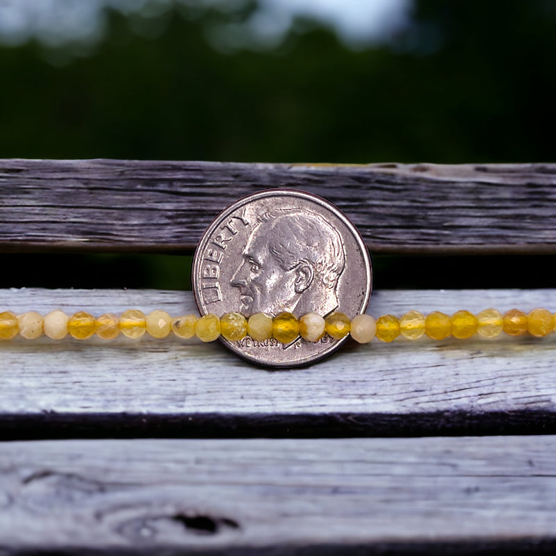 3mm Round Cut Yellow Opal