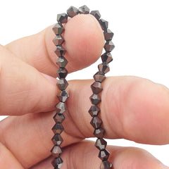 4mm Thunder Polish Glass Crystal Bicone Hematite