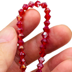 6mm Thunder Polish Glass Crystal Bicone Med. Siam AB