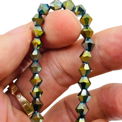 6mm Thunder Polish Glass Crystal Bicone Green Light
