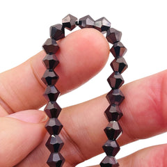 6mm Thunder Polish Glass Crystal Bicone Hematite
