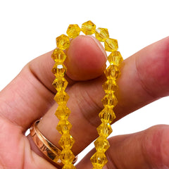 6mm Thunder Polish Glass Crystal Bicone Yellow Gold