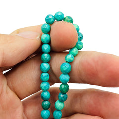 6mm Faceted Round Turquoise Dyed and Stabilized
